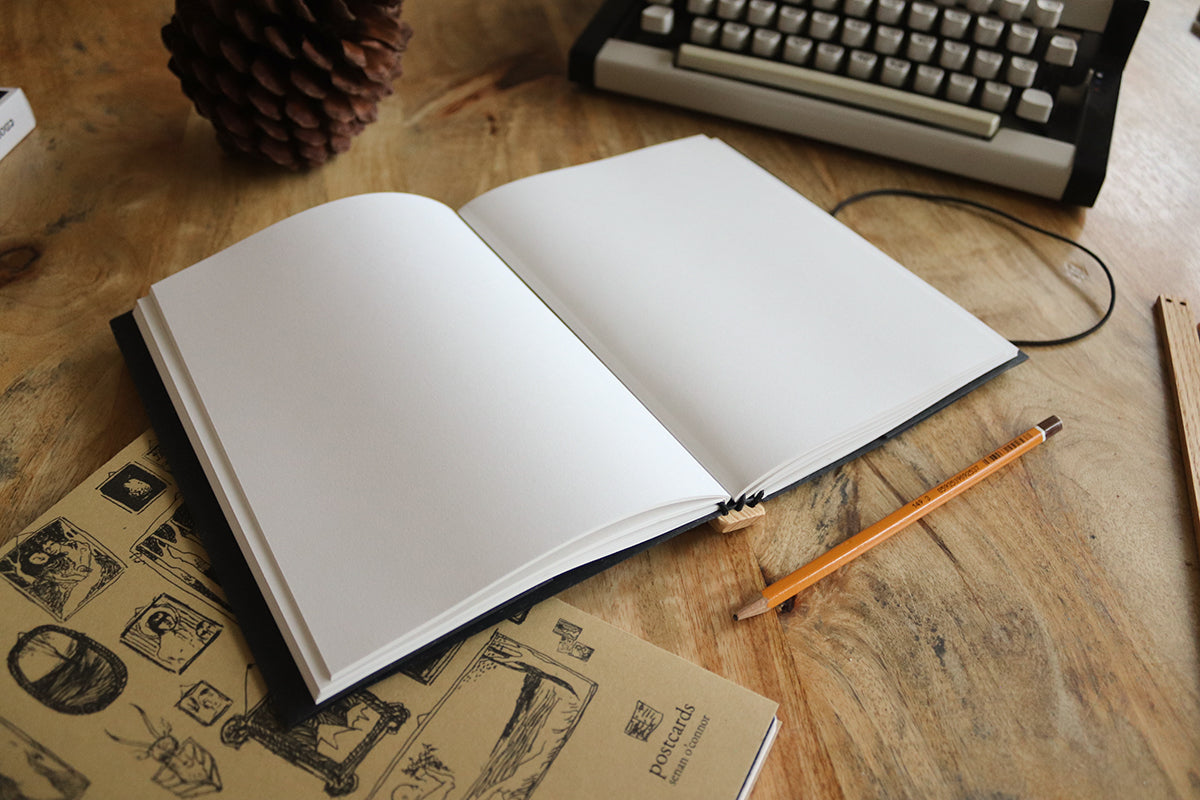 the one with the pencil. a5, black & yellow