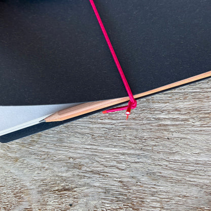 the bookstick and hb pencil